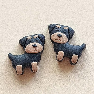 Rottweiler örhängen av lera 1