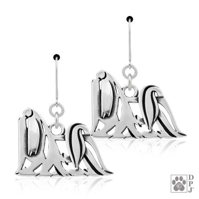 Malteser örhängen av silver helfigur
