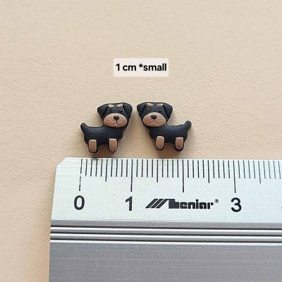 Rottweiler örhängen av lera 1