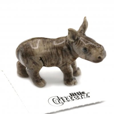 Vit noshörningskalv miniatyr porslinsfigur Courage